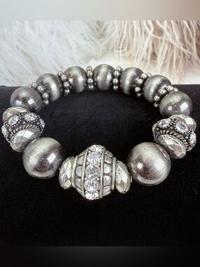Gorgeous, dark, gray gun metal dressy, small stretch bracelet with some bling!
